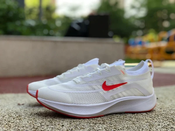 Zoom fly4 blanc et rouge Nike Zoom Fly 4 Nike amorti plaque de carbone marathon hommes et femmes en cours d'exécution CT2392-006