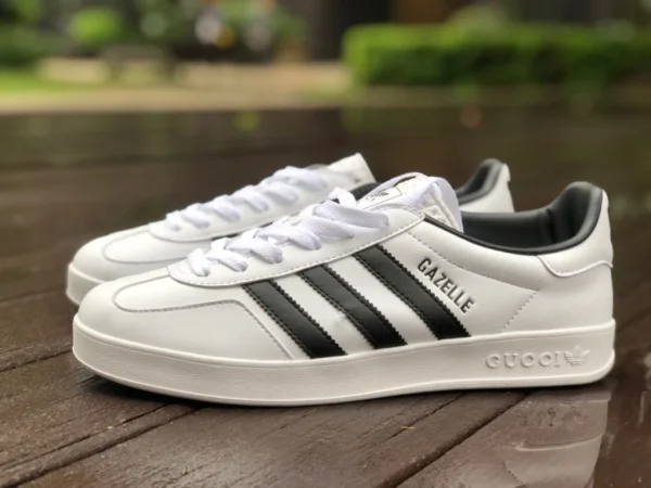 Gucci co-marqué Adidas blanc et noir Gucci x Adidas Gucci co-marqué Adidas Originals Gazelle "Esquisite Gucci" série antilope basse