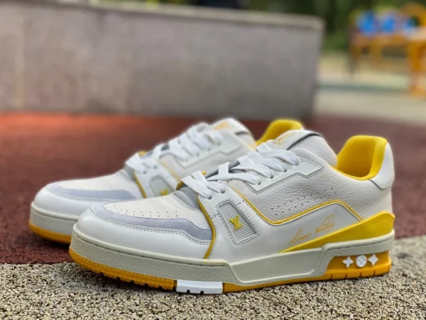 LV blanc et jaune LoUIS VUTTON Trainer en cuir de veau bout rond à lacets panneau bas